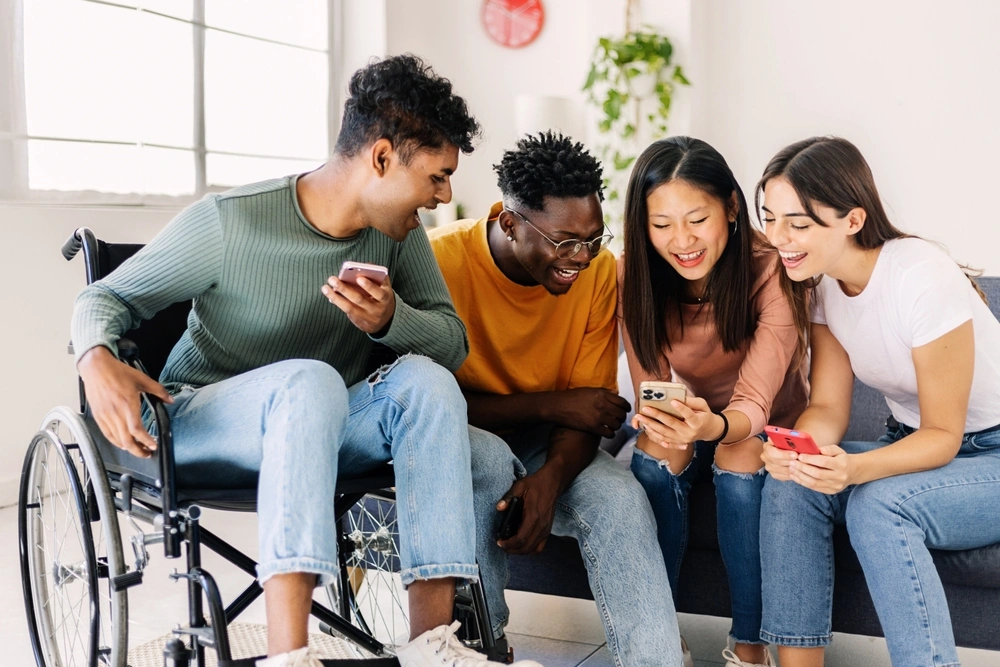 Friends watching a something funny together on phone